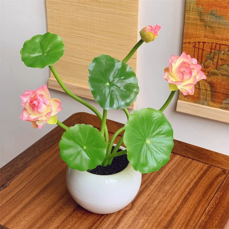 Bloemstuk met lotusbloemen