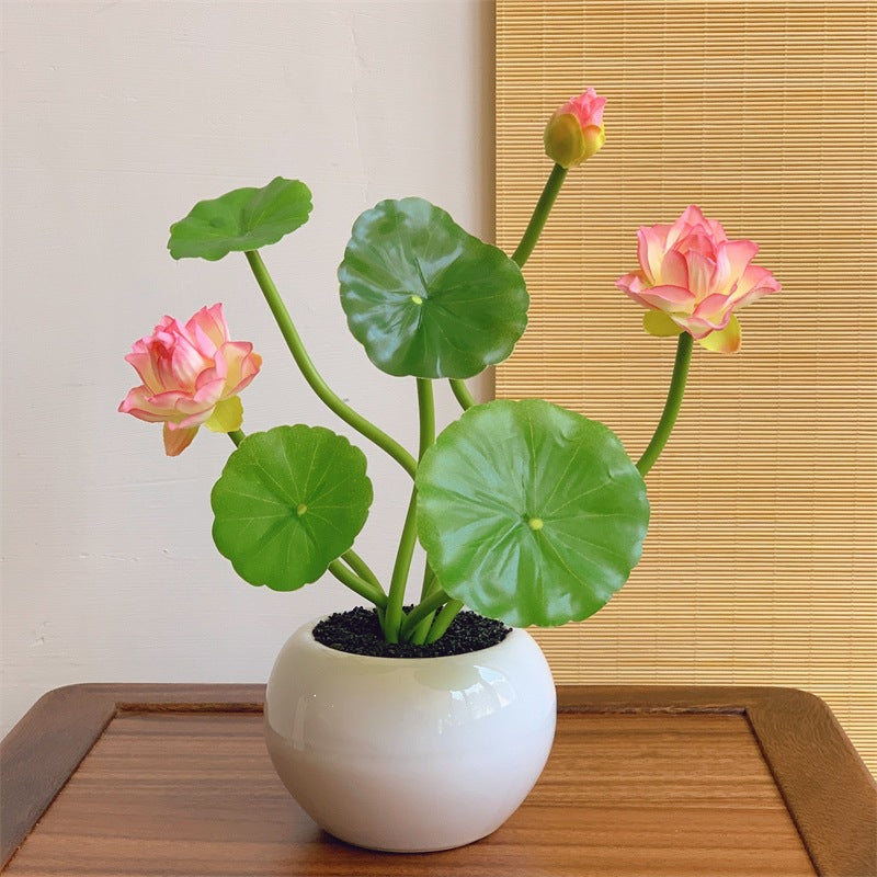 Bloemstuk met lotusbloemen