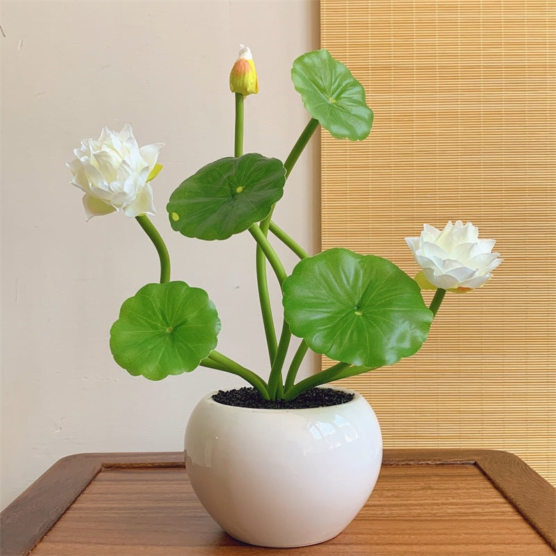 Bloemstuk met lotusbloemen