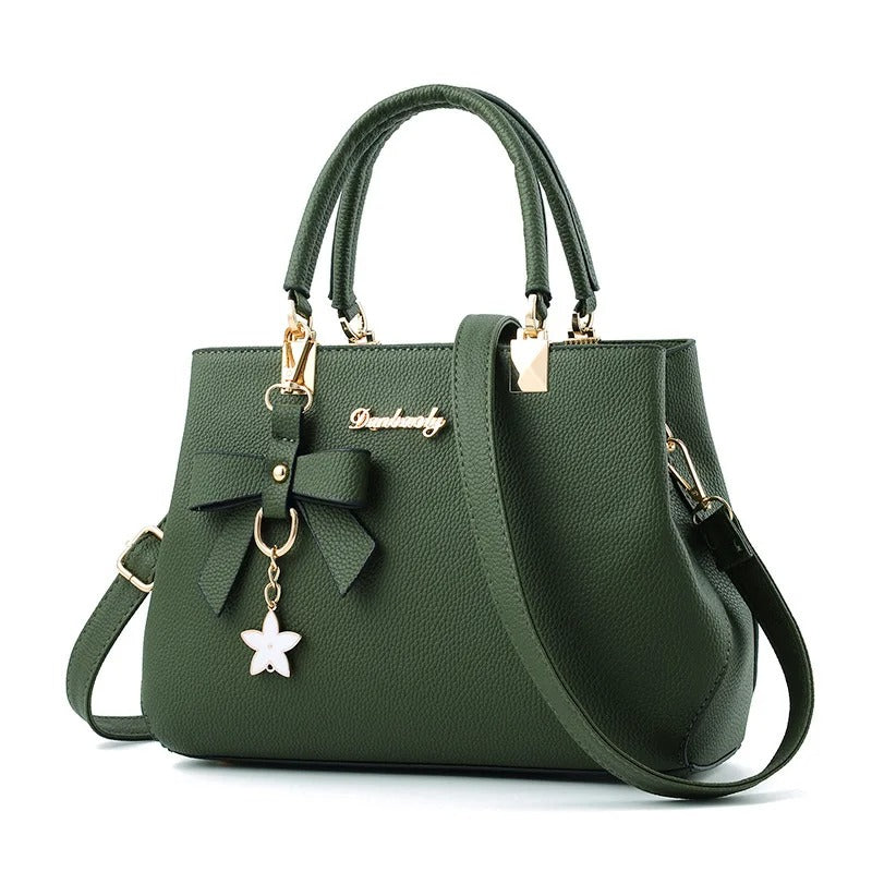 Dames crossbodytas met bloemenhanger