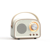 Draagbare bluetooth-speaker in retrostijl met hoogwaardige geluidskwaliteit en lange batterijduur – compact en stijlvol ontwerp