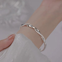 Elegante en tijdloze gevlochten zilveren armband voor dames