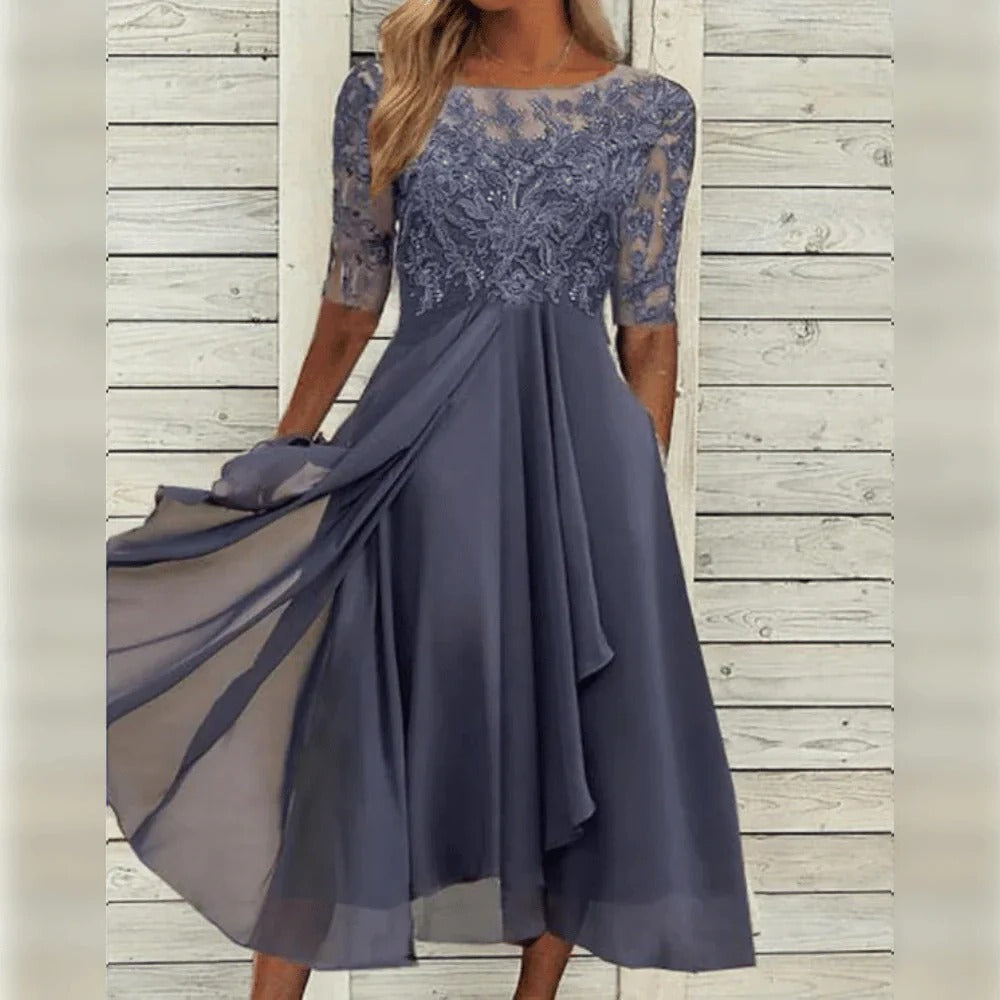 Elegante midi-jurk met kantdetail en soepelvallende rok voor feestelijke gelegenheden
