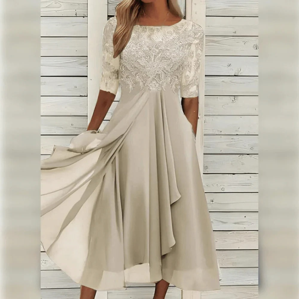 Elegante midi-jurk met kantdetail en soepelvallende rok voor feestelijke gelegenheden