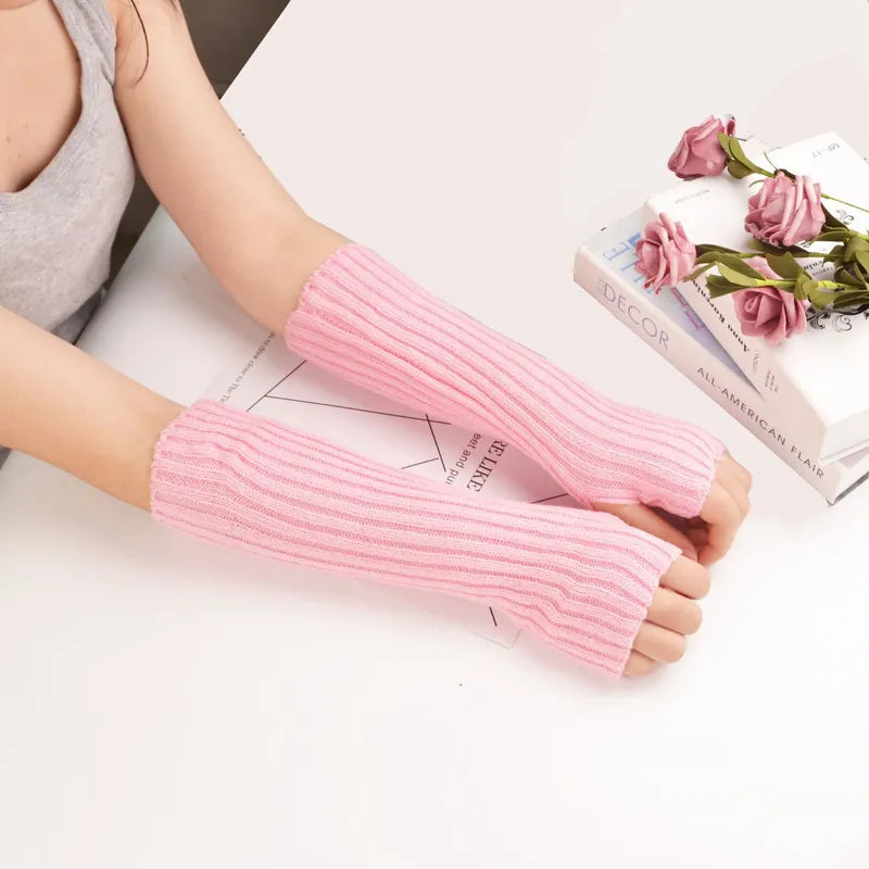 Lange gebreide vingerloze handschoenen