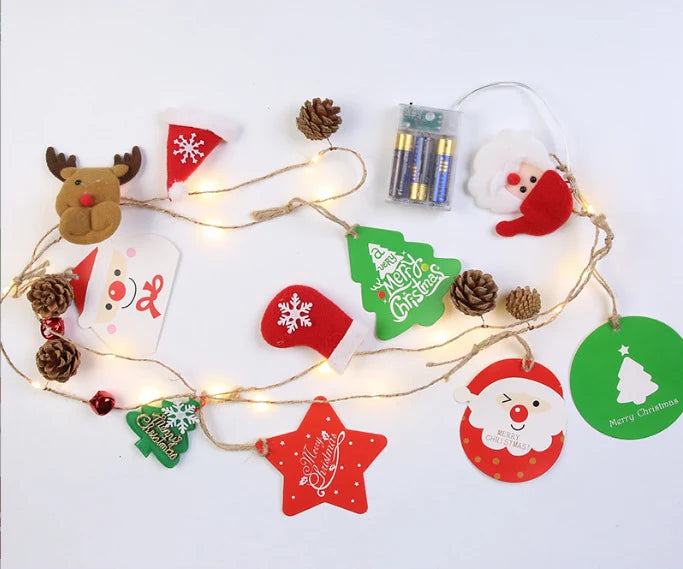 Led-kerstslingerverlichting op batterijen met warmwit snoer en dennenappels