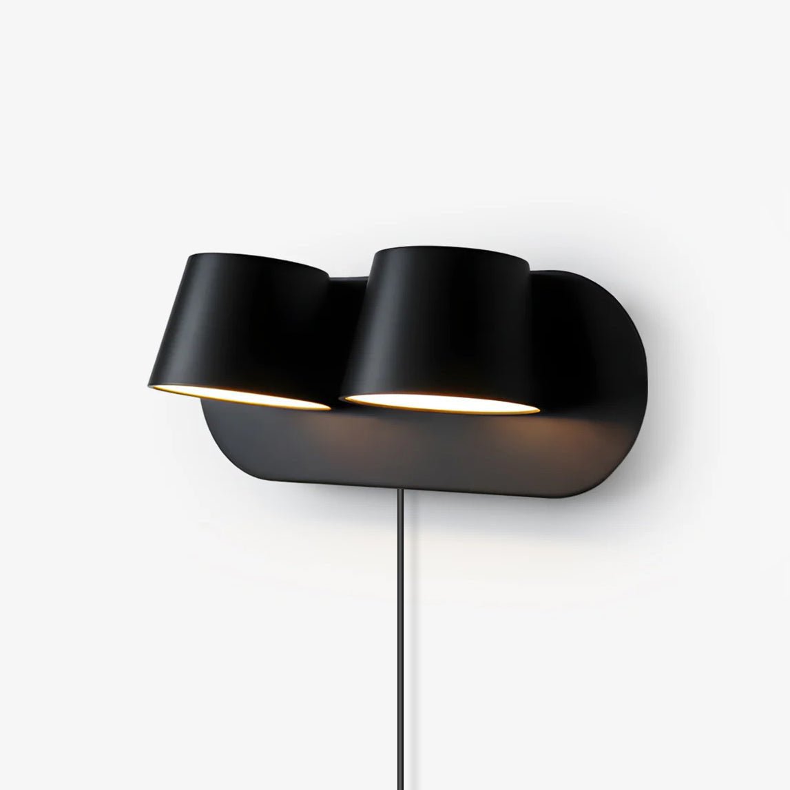 LED-wandleeslamp in zwarte en witte afwerking