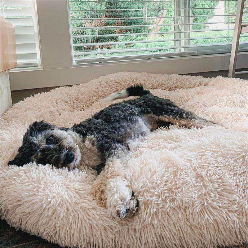 Pluizige angstverminderende donut hondenmand voor alle honden