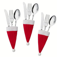 Set van vilten kerstmuts-bestekhouders met pompon voor kersttafeldecoratie