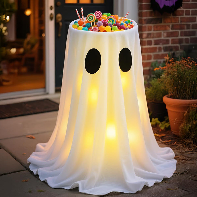 Verlichte spook-snoepschaal met gedrapeerde stof en led-lantaarn