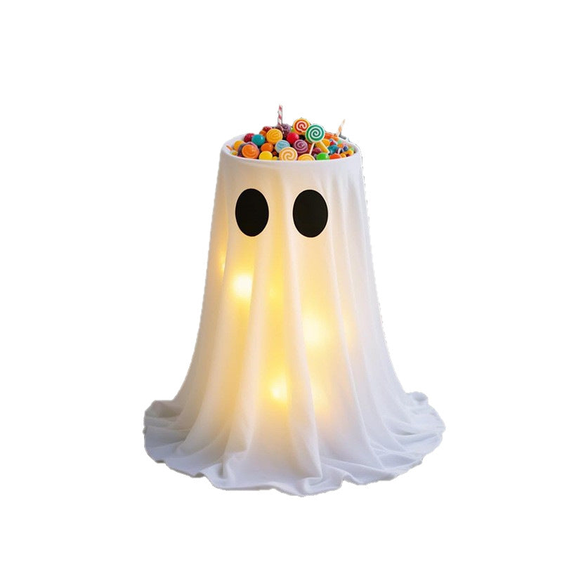 Verlichte spook-snoepschaal met gedrapeerde stof en led-lantaarn